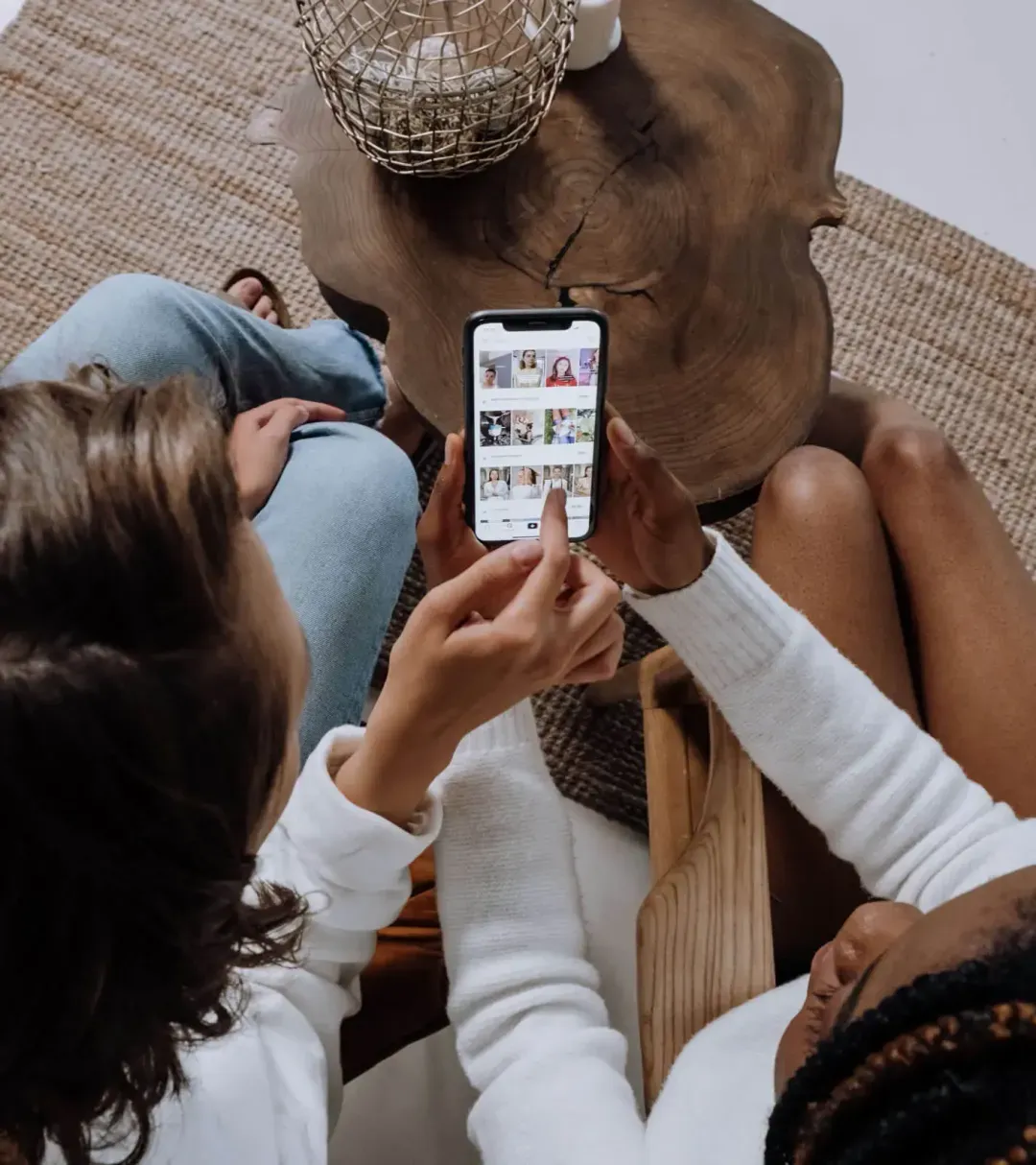 Two people using a phone